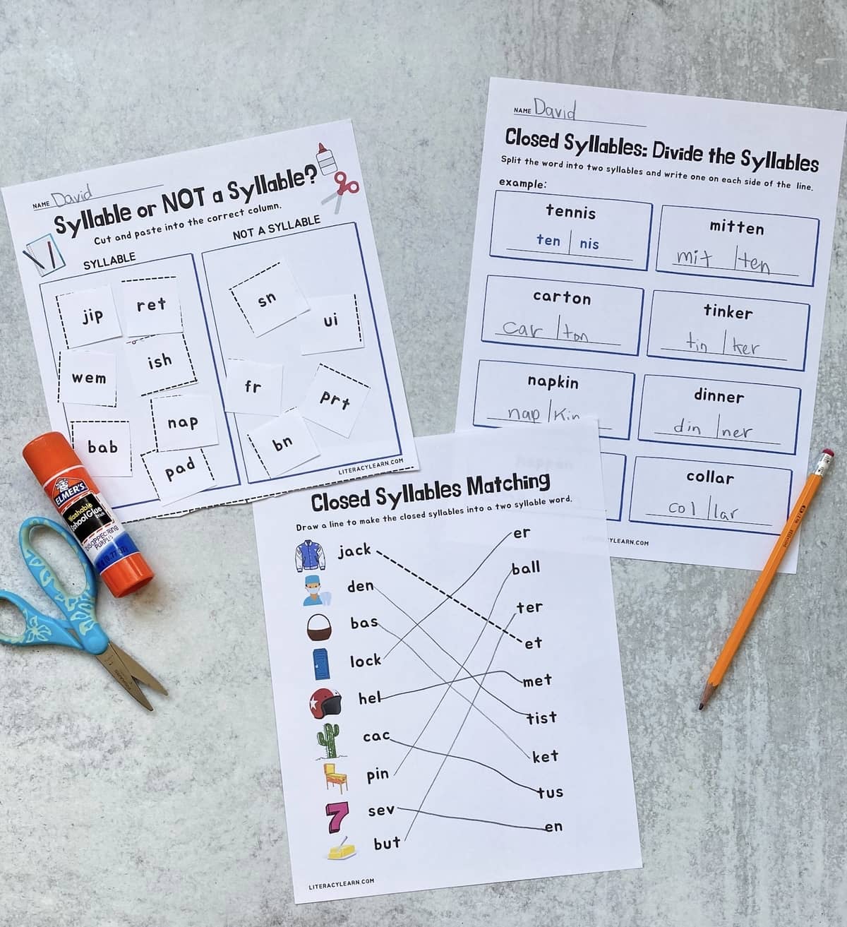 Three printed and completed closed syllables worksheets. 