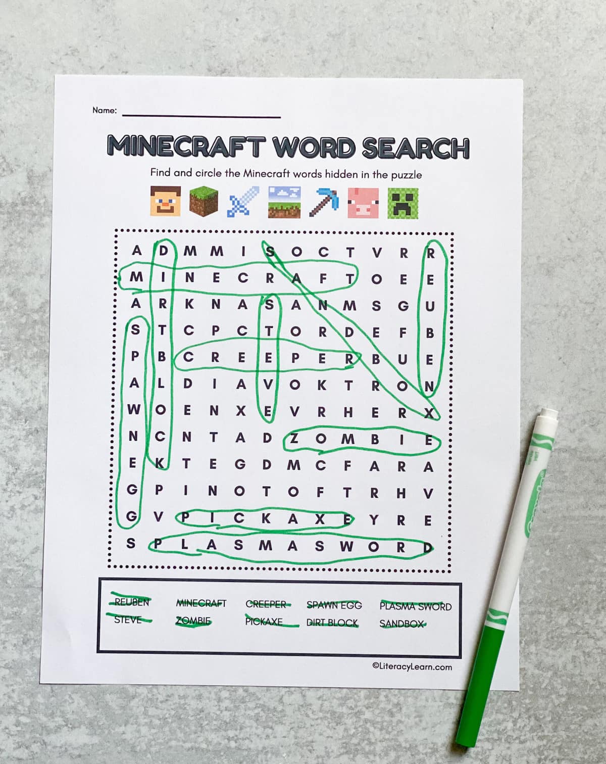 The printed and completed word search with a green marker.