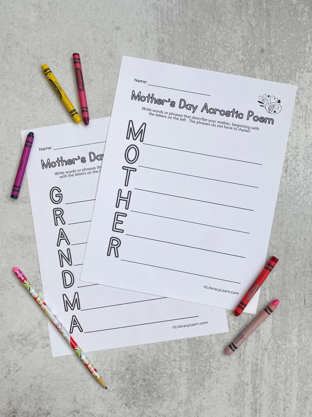 The printed Mother and Grandma acrostic worksheets with crayons and a pencil. 