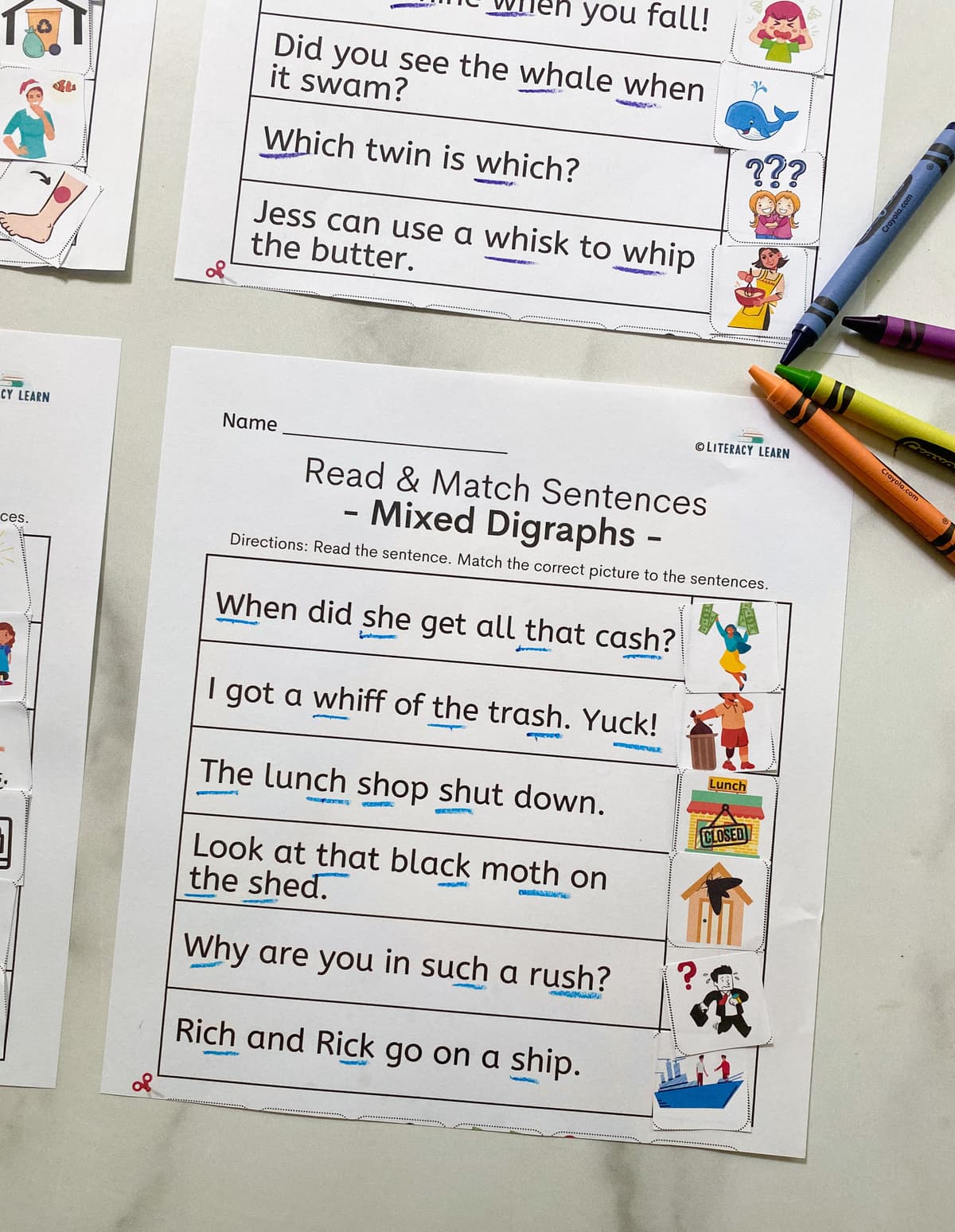 Close up of the completed mixed digraph sentences worksheet. 