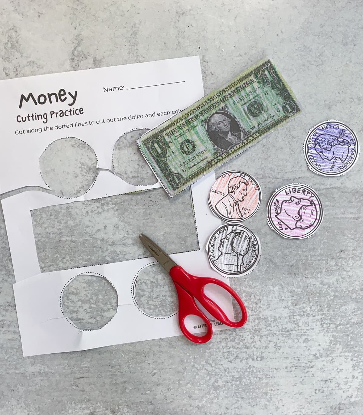 The money cutting scissor practice worksheet completed. 