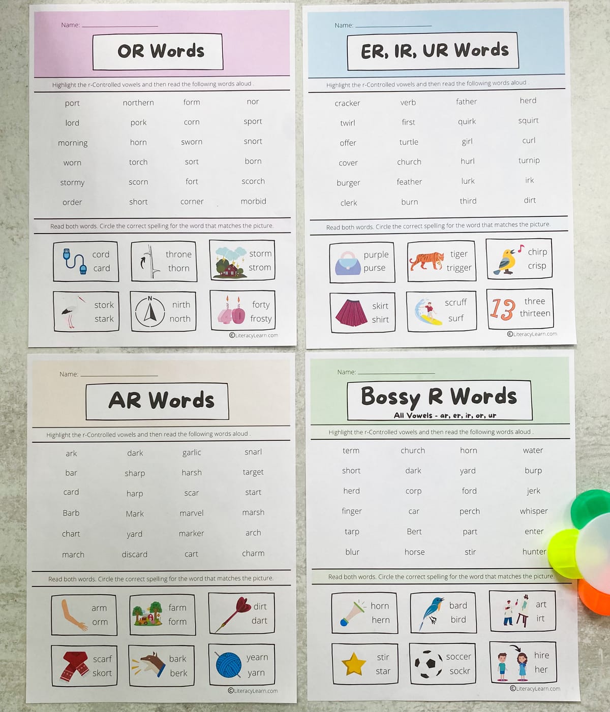 The four colorful printed r-controlled worksheets laid out with a highlighter. 