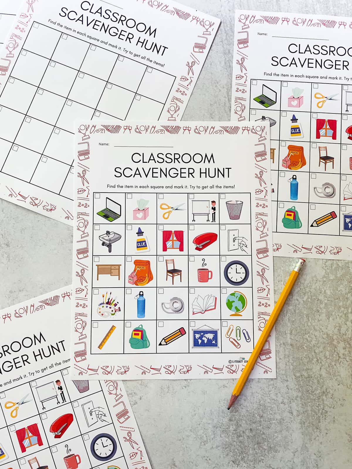 Four printed classroom scavenger hunt pages with a pencil. 