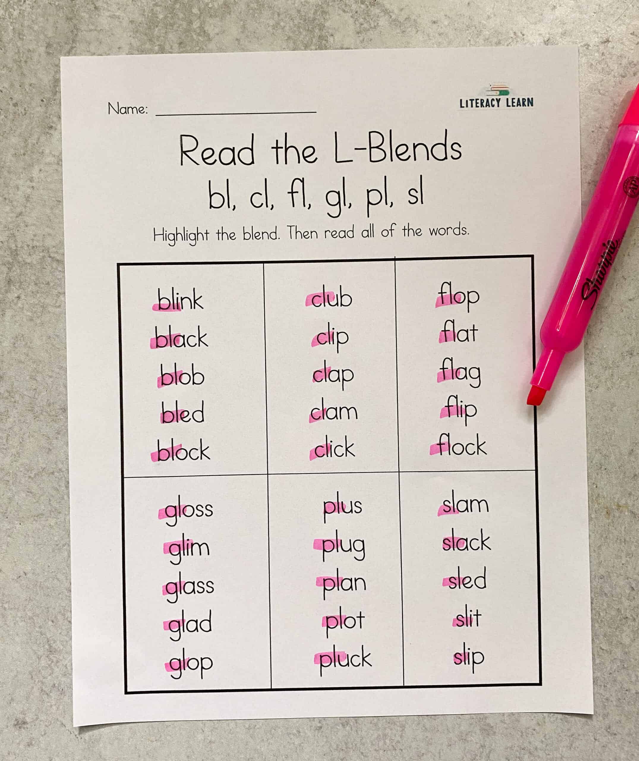 The printed Write the L-Blend worksheet with a pink highlighter. 