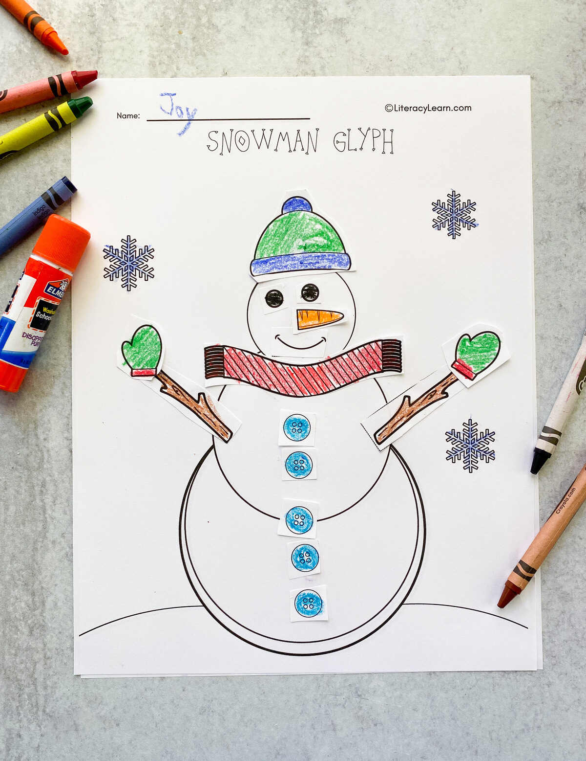 A student's finished and colored in snowman glyph. 
