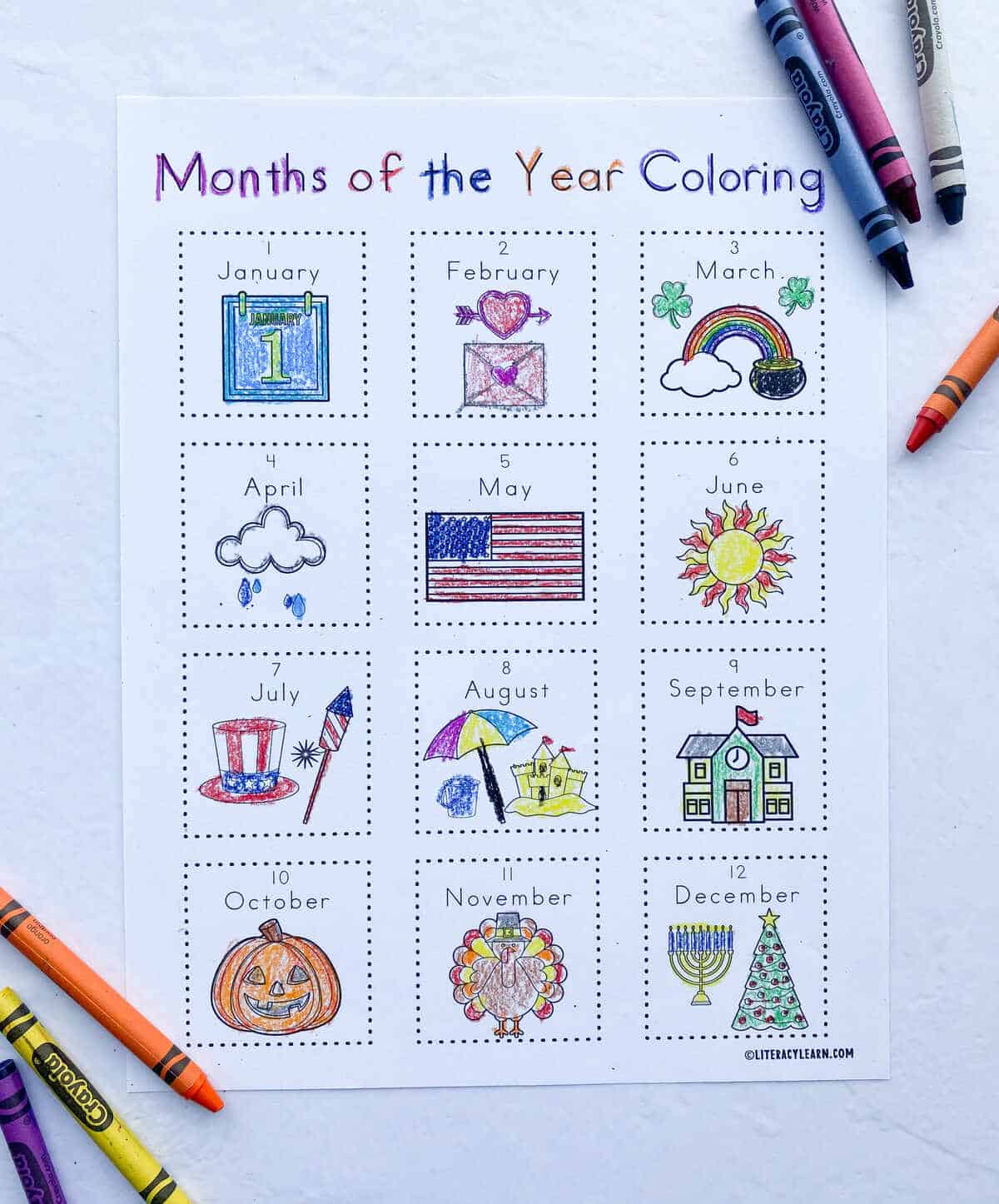 The months of the year coloring worksheet with crayons. 