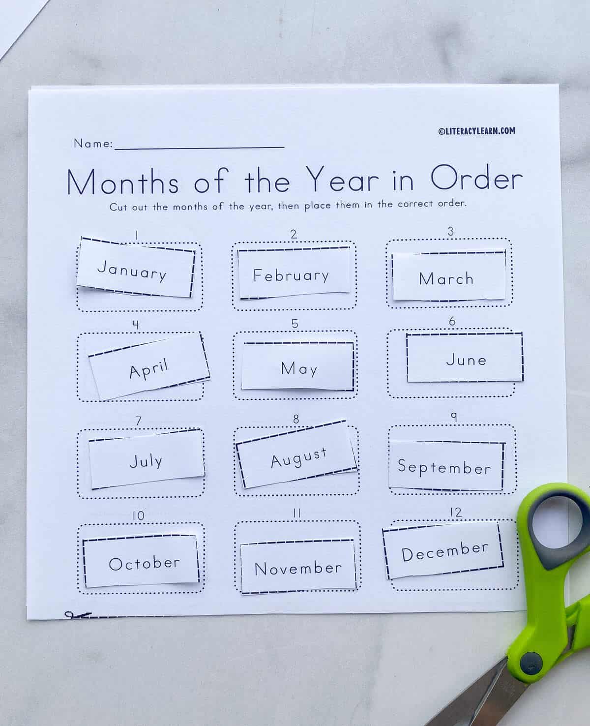 The finished worksheet with all the months cut out and placed in the correct order.