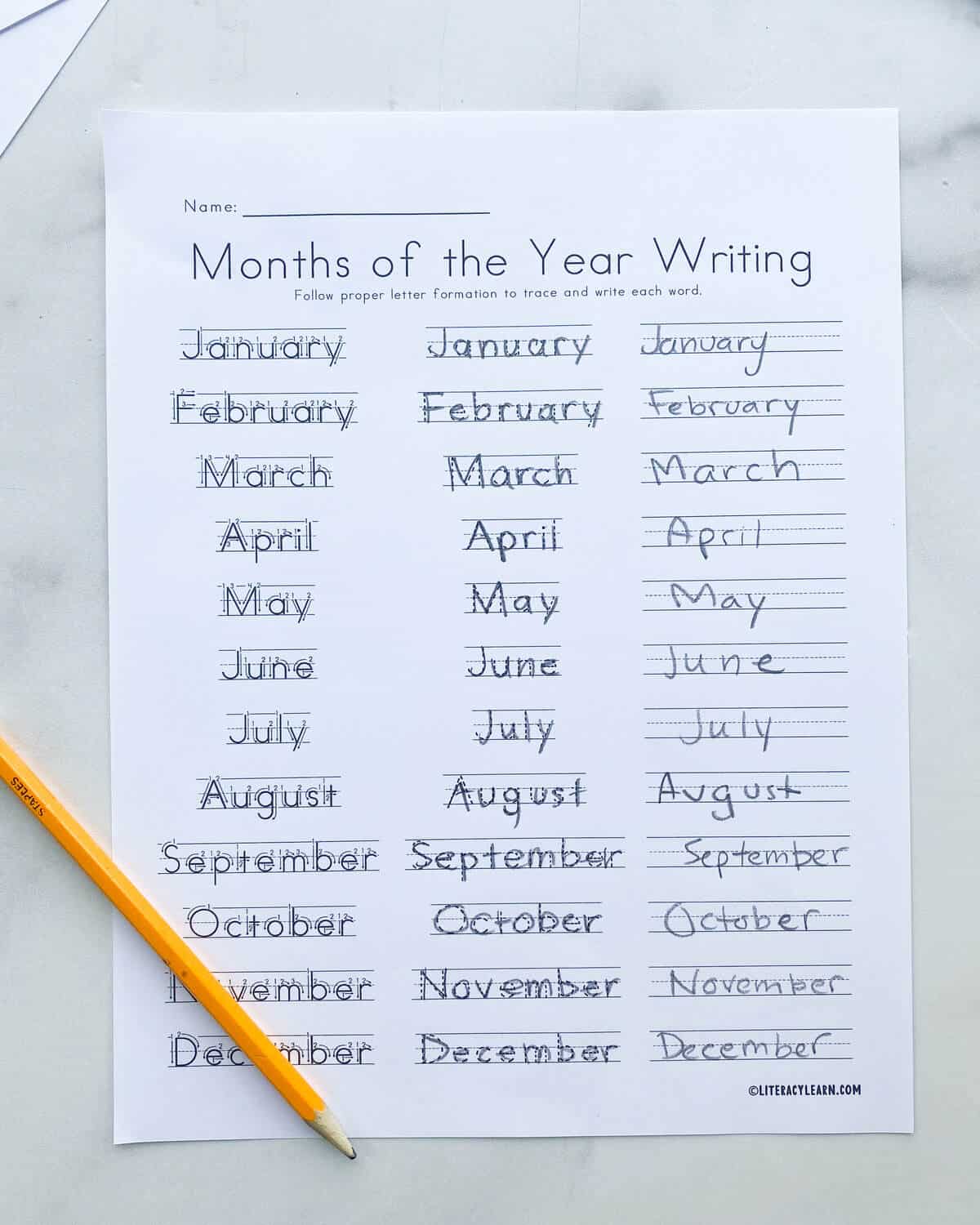 Finished worksheet with the months of the year traced then written out. 