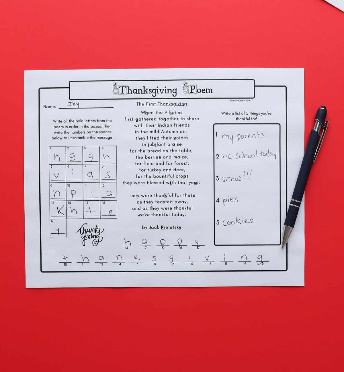 A printed and completed Thanksgiving Poem activity worksheet on a red background.