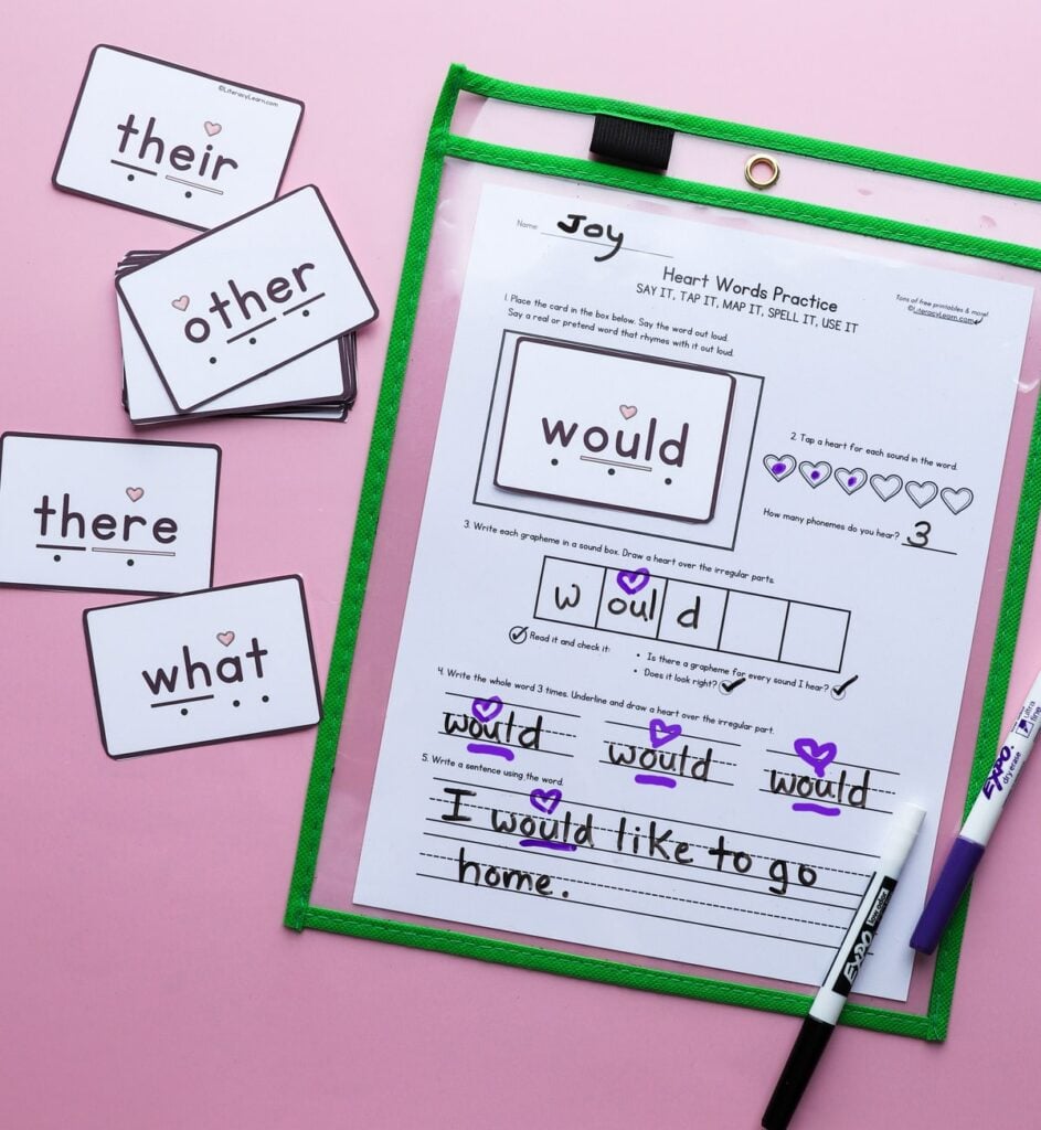 Heart word flashcards with a practice worksheet.