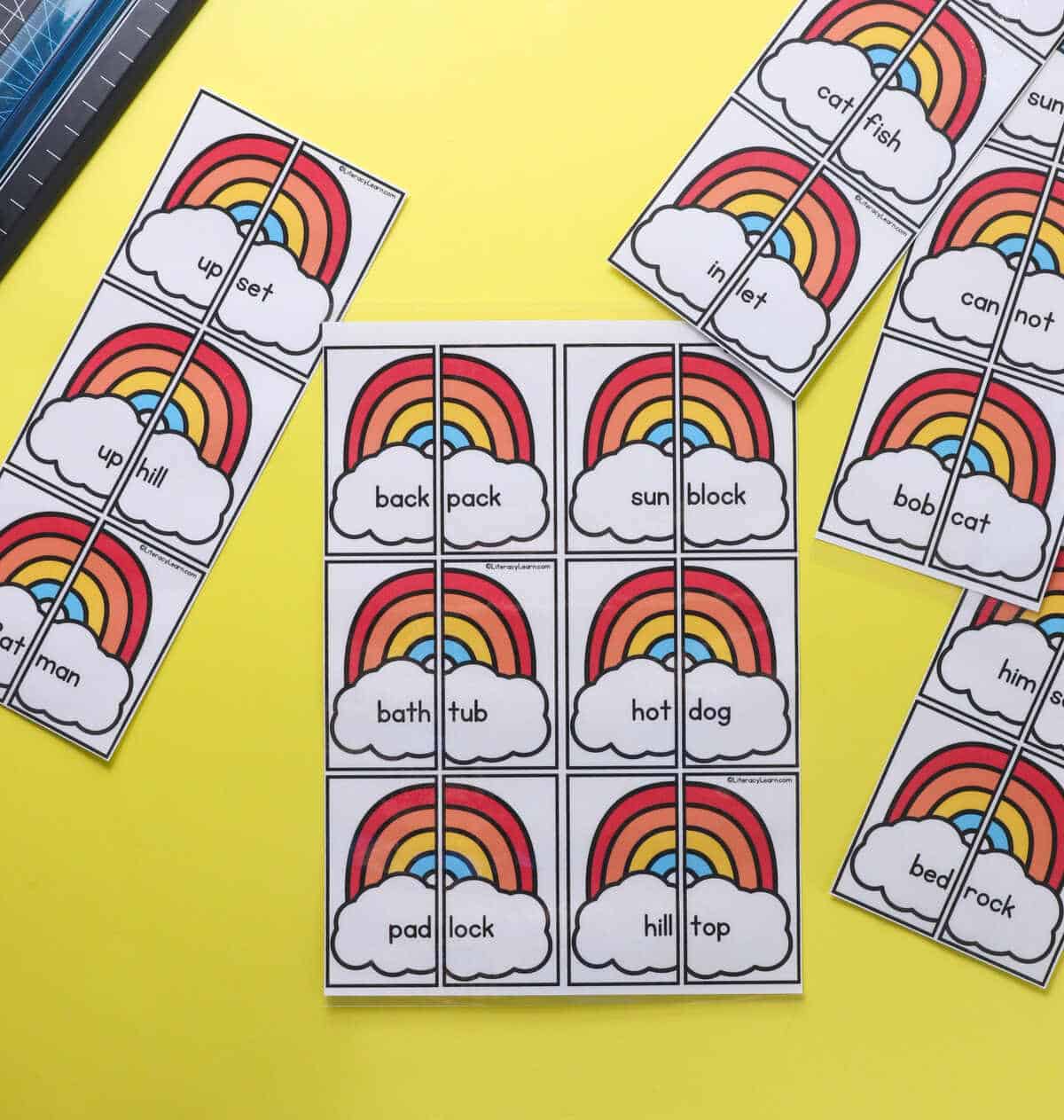 Pages of rainbow-themed decodable compound word puzzles.