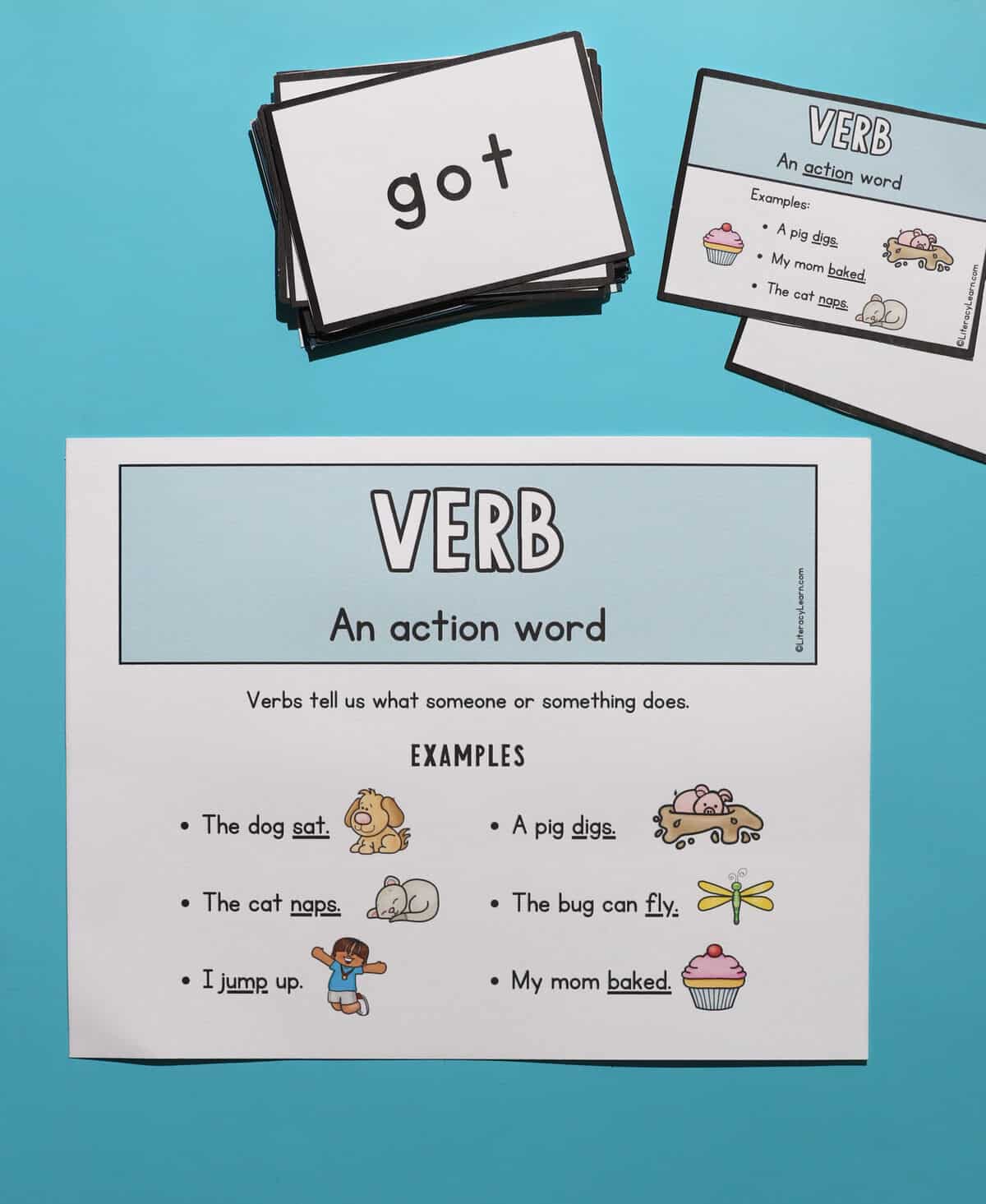 A printed verbs poster with verbs flashcards.