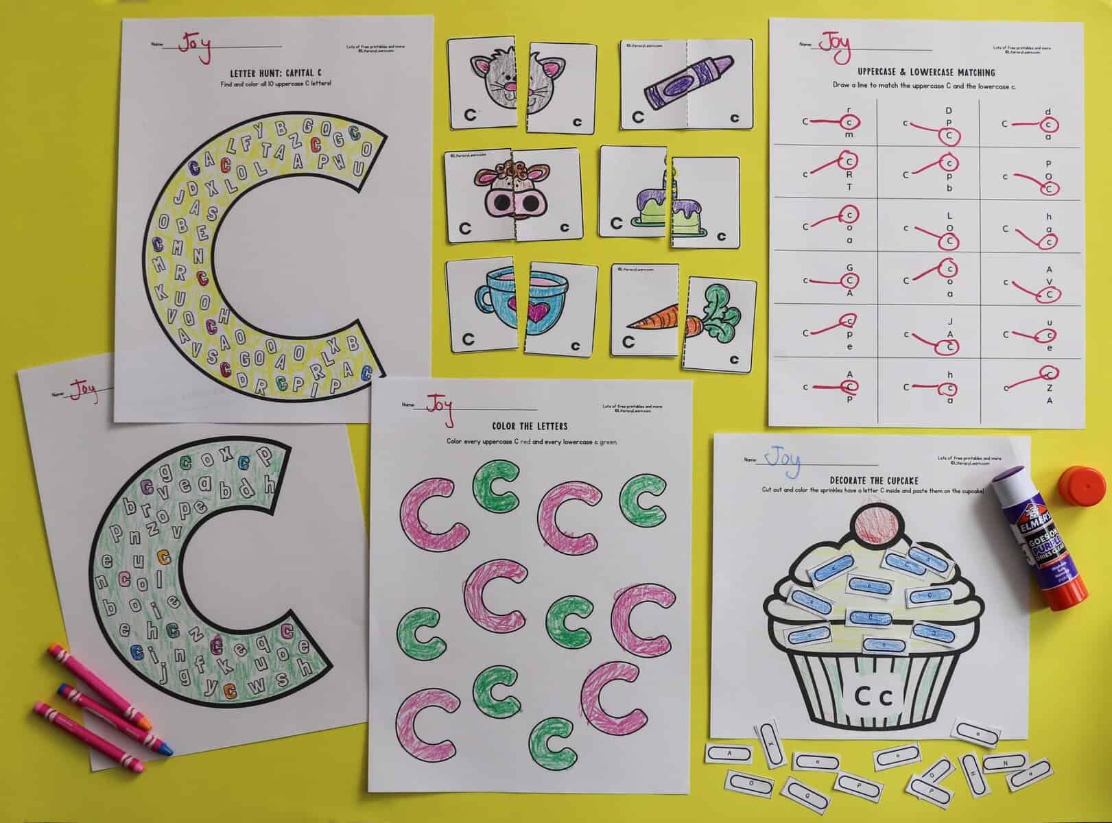 Six printed and completed Letter C uppercase and lowercase identification worksheets.