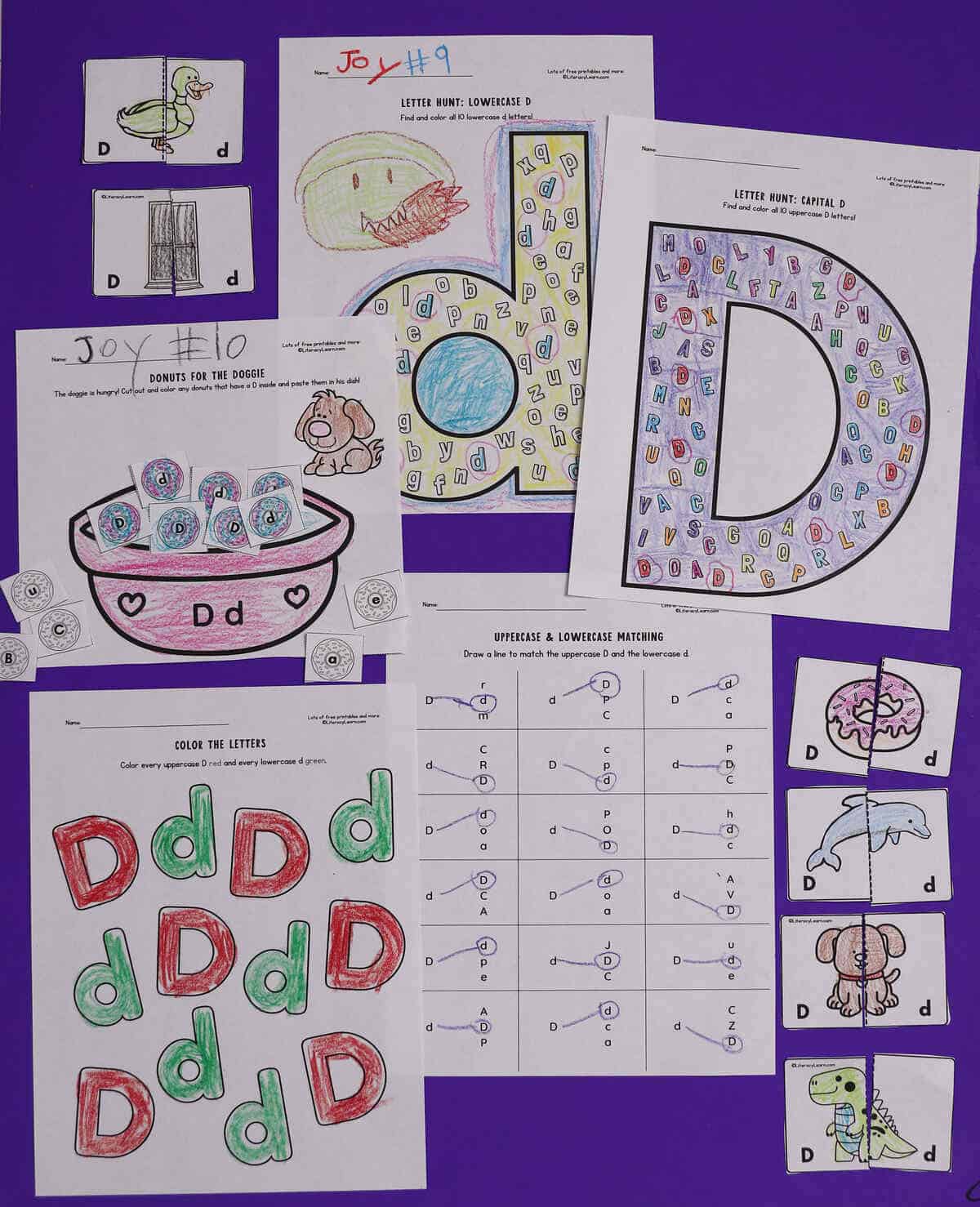 Six printed and completed Letter D worksheets focusing on uppercase and lowercase letter d.