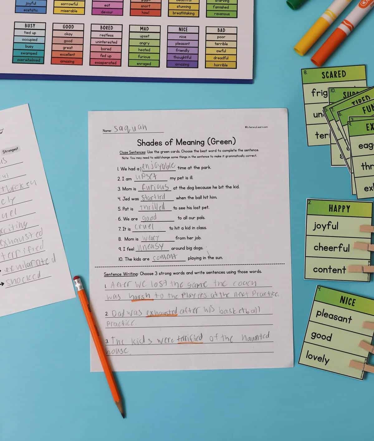 A printed and completed Shades of Meaning Cloze Sentences worksheet.