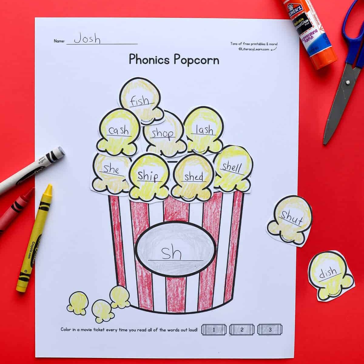 A popcorn themed phonics printable cut out, colored, and completed.